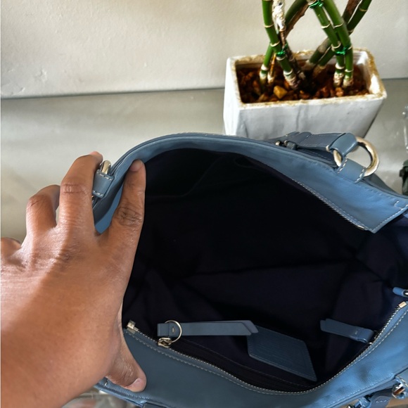 Clean inside and out just one little red dot on the front of bag - Picture 2 of 3